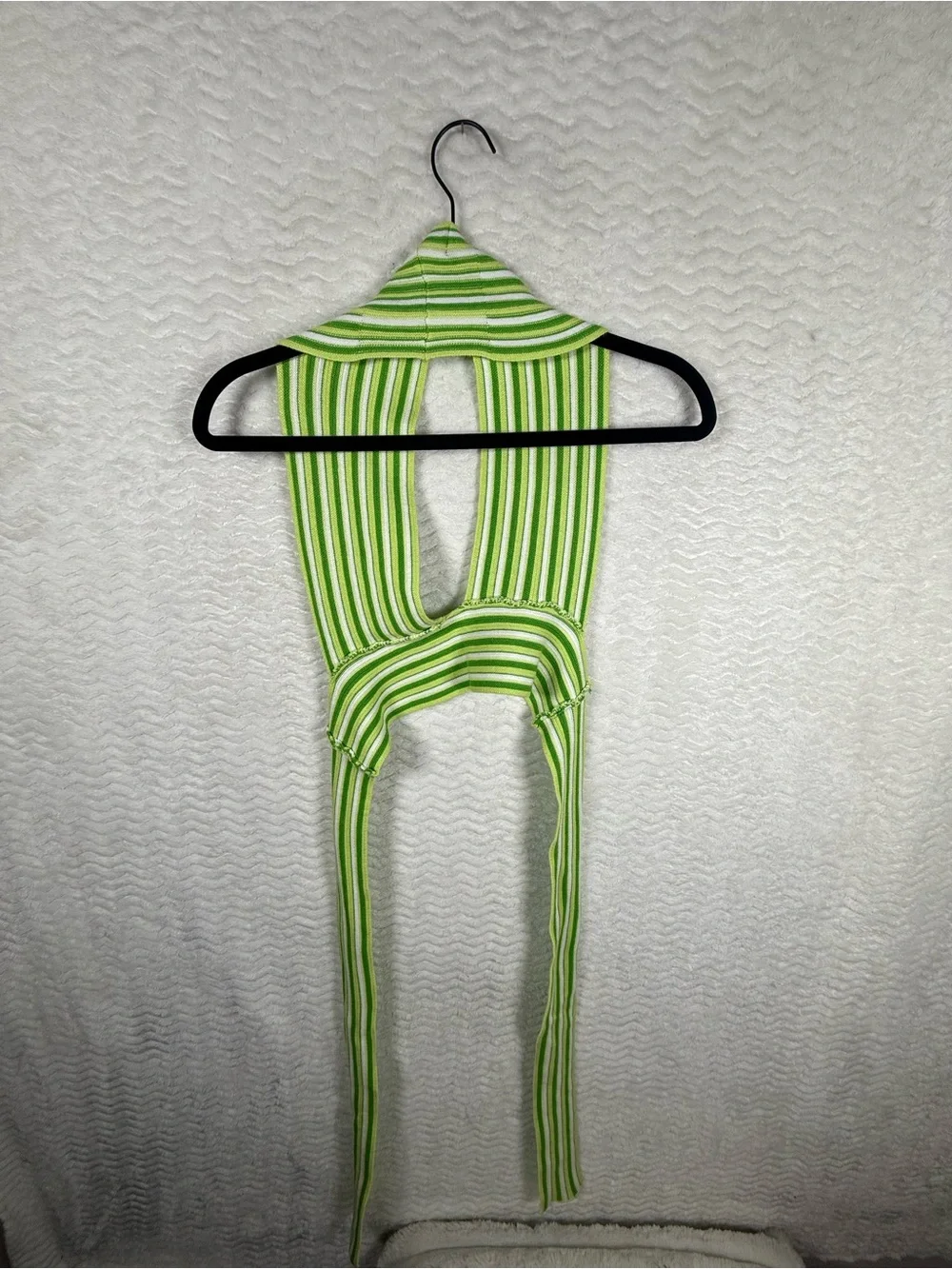 Cider striped halter top features a distinctive tie-back design vibrant green